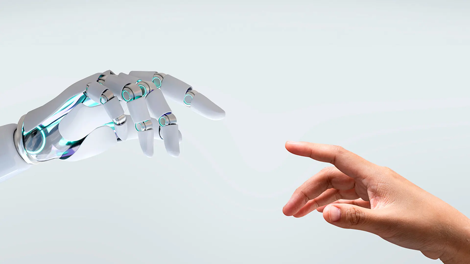 Mano humana acercándose a mano de robot para tocarse con un dedo representando si el mejor traductor del mundo es humano o automático